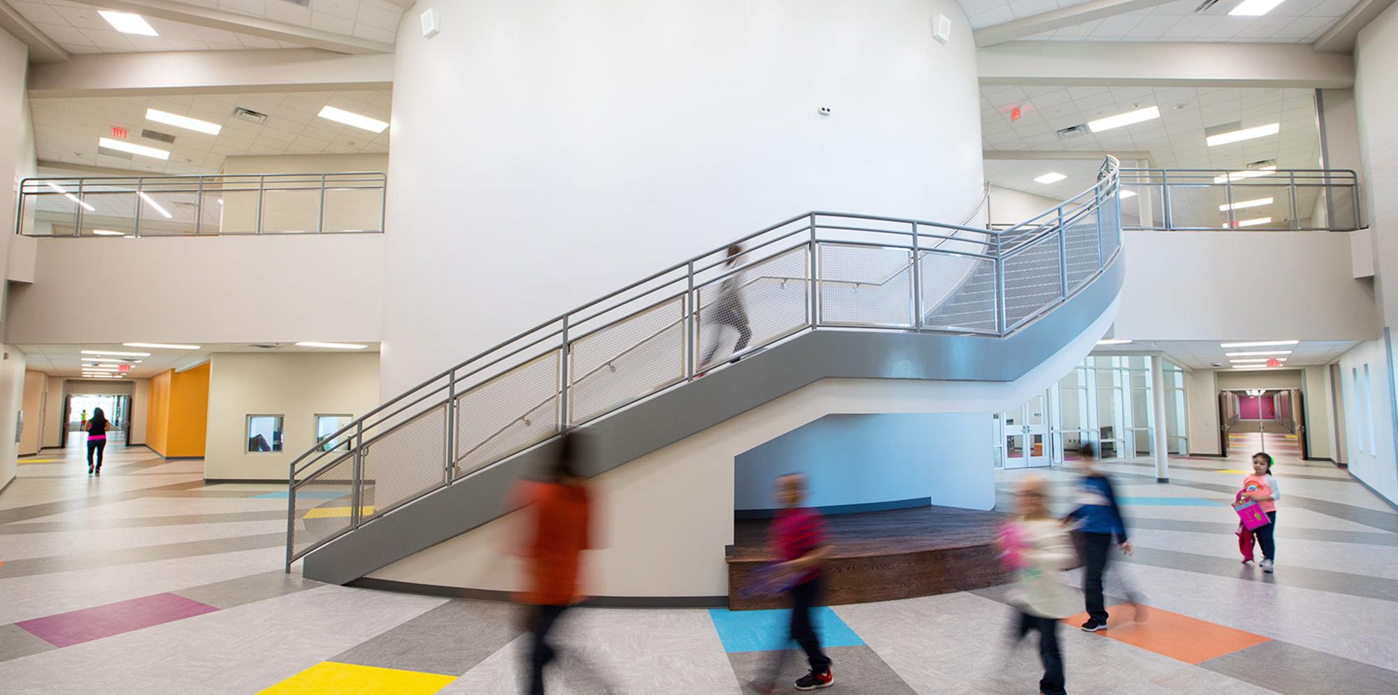 Students in atrium at Jim and Pam Wells Elementary School